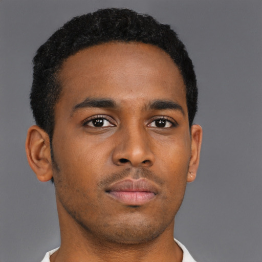 Neutral black young-adult male with short  brown hair and brown eyes