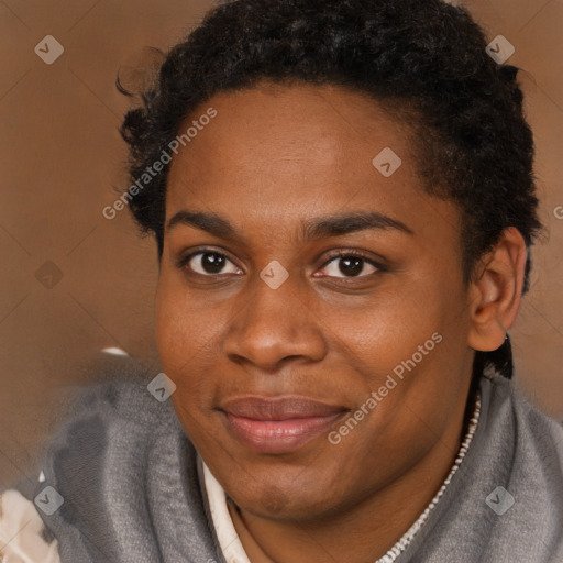 Joyful black young-adult female with short  brown hair and brown eyes