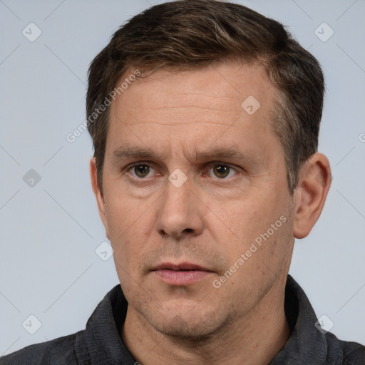 Neutral white adult male with short  brown hair and brown eyes