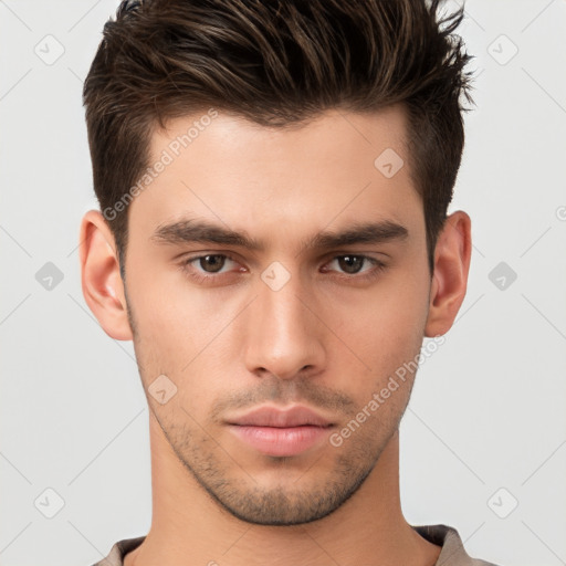 Neutral white young-adult male with short  brown hair and brown eyes