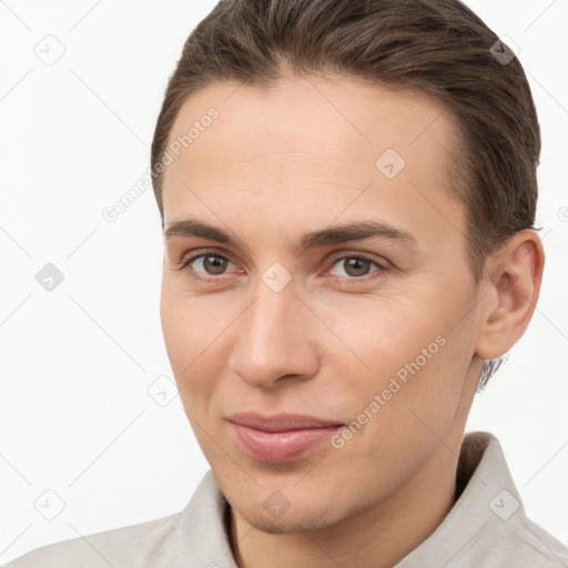 Joyful white young-adult male with short  brown hair and brown eyes