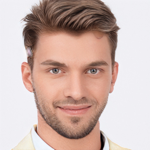 Joyful white young-adult male with short  brown hair and grey eyes