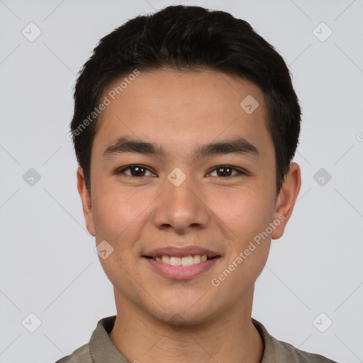 Joyful asian young-adult male with short  brown hair and brown eyes