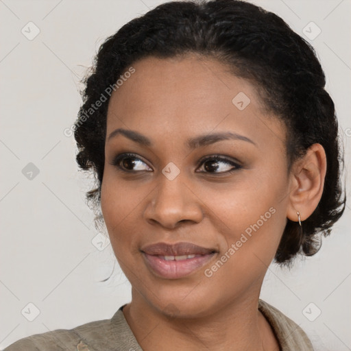 Joyful black young-adult female with medium  black hair and brown eyes