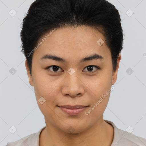 Joyful asian young-adult female with short  brown hair and brown eyes