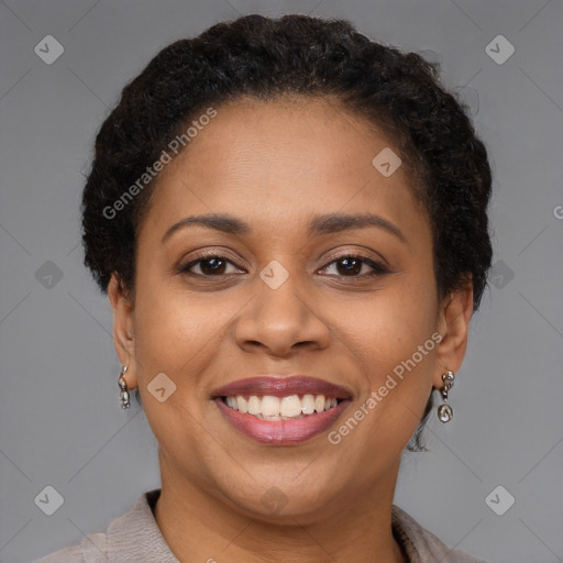 Joyful latino young-adult female with short  brown hair and brown eyes