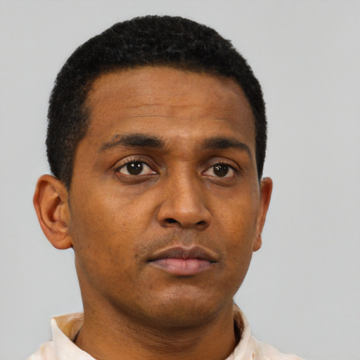 Neutral black young-adult male with short  black hair and brown eyes