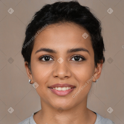 Joyful latino young-adult female with short  brown hair and brown eyes