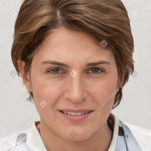 Joyful white adult female with short  brown hair and brown eyes