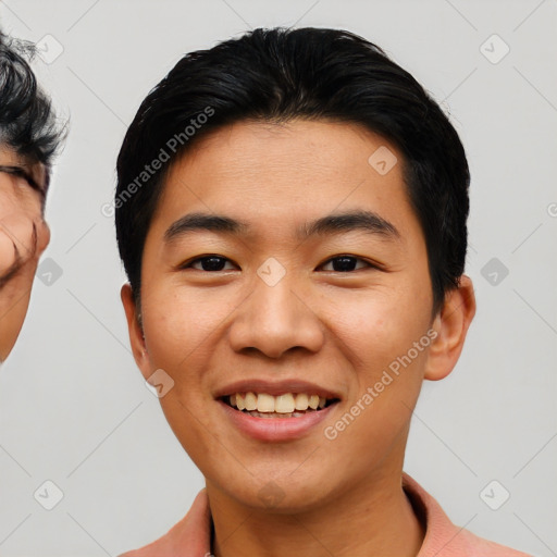 Joyful asian young-adult male with short  black hair and brown eyes