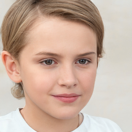 Joyful white child female with medium  brown hair and brown eyes