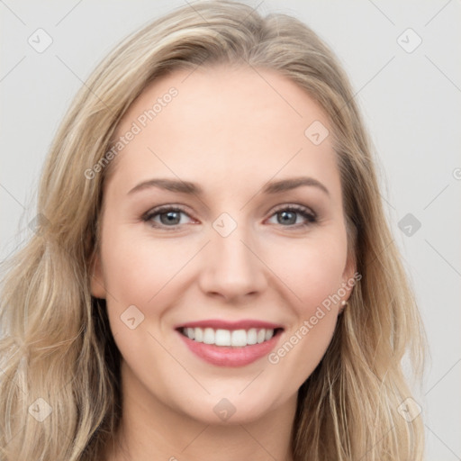 Joyful white young-adult female with long  brown hair and grey eyes