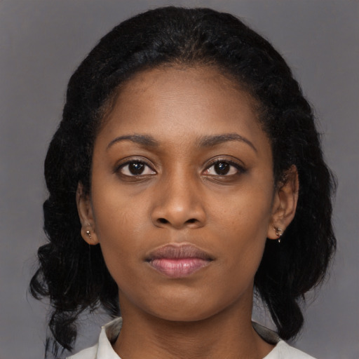 Neutral black young-adult female with medium  black hair and brown eyes