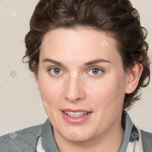 Joyful white young-adult female with medium  brown hair and blue eyes