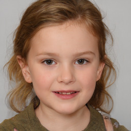 Joyful white child female with medium  brown hair and brown eyes