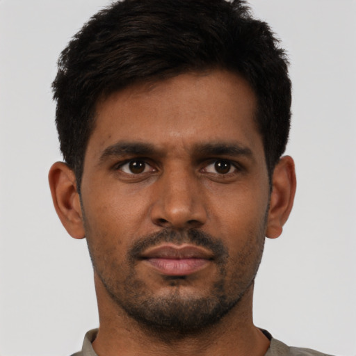 Neutral latino young-adult male with short  brown hair and brown eyes