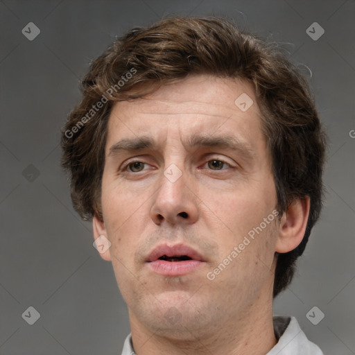 Neutral white adult male with short  brown hair and brown eyes