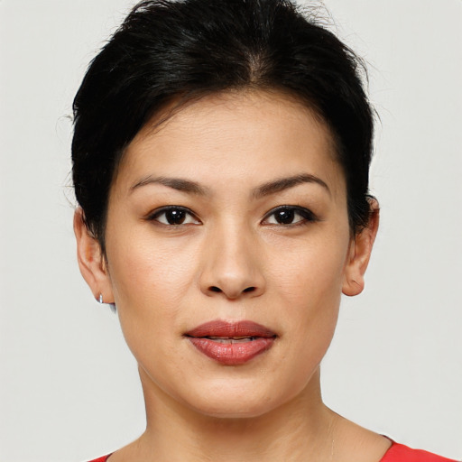Joyful white young-adult female with short  black hair and brown eyes