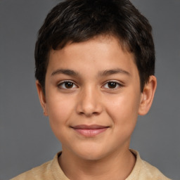 Joyful white child male with short  brown hair and brown eyes