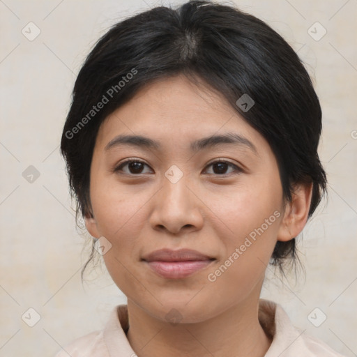 Joyful asian young-adult female with medium  brown hair and brown eyes