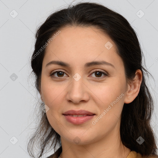 Joyful white young-adult female with long  brown hair and brown eyes