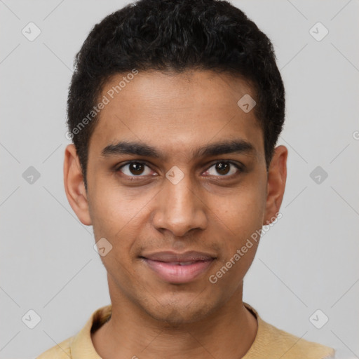 Joyful latino young-adult male with short  black hair and brown eyes