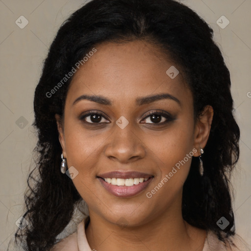 Joyful black young-adult female with long  brown hair and brown eyes