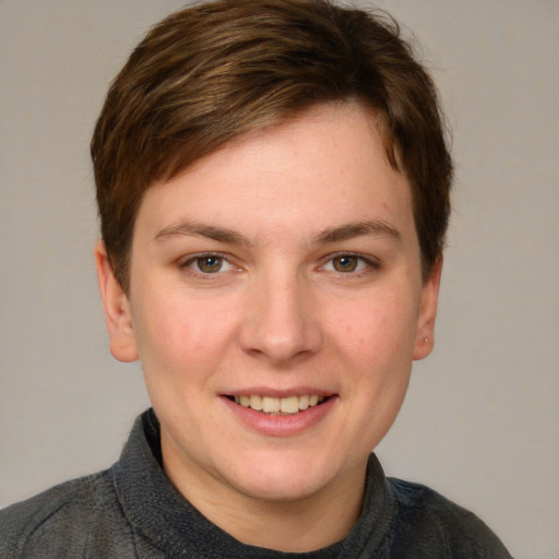 Joyful white young-adult female with short  brown hair and grey eyes