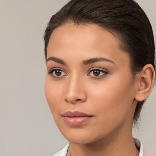 Neutral white young-adult female with medium  brown hair and brown eyes