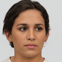 Neutral white young-adult female with short  brown hair and brown eyes