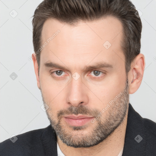 Neutral white adult male with short  brown hair and brown eyes