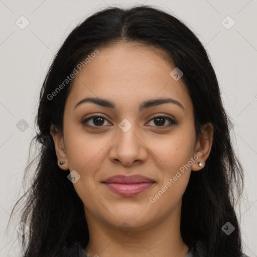 Joyful latino young-adult female with long  brown hair and brown eyes