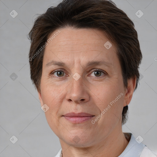 Joyful white adult female with short  brown hair and brown eyes