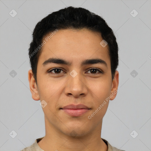 Joyful latino young-adult male with short  black hair and brown eyes