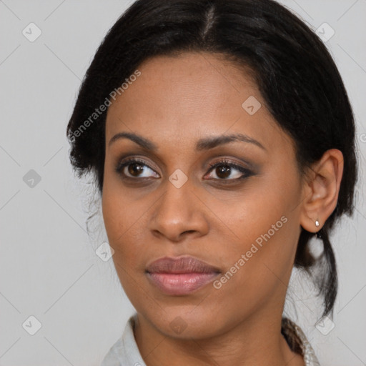 Joyful latino young-adult female with medium  brown hair and brown eyes