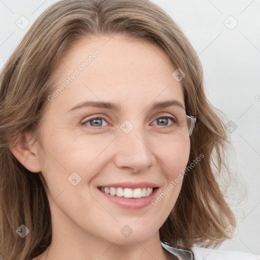 Joyful white young-adult female with long  brown hair and blue eyes