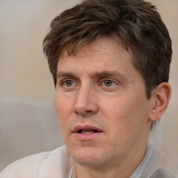 Neutral white adult male with short  brown hair and brown eyes