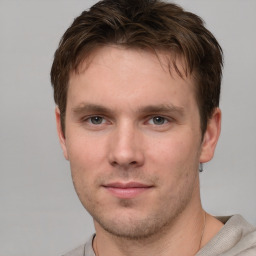 Neutral white young-adult male with short  brown hair and grey eyes