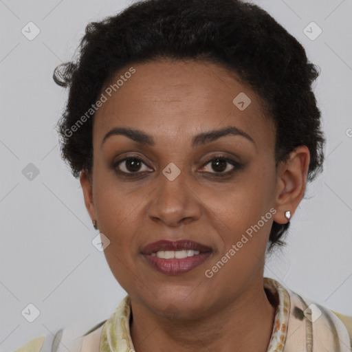 Joyful latino young-adult female with short  brown hair and brown eyes