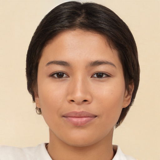 Neutral white young-adult female with short  brown hair and brown eyes