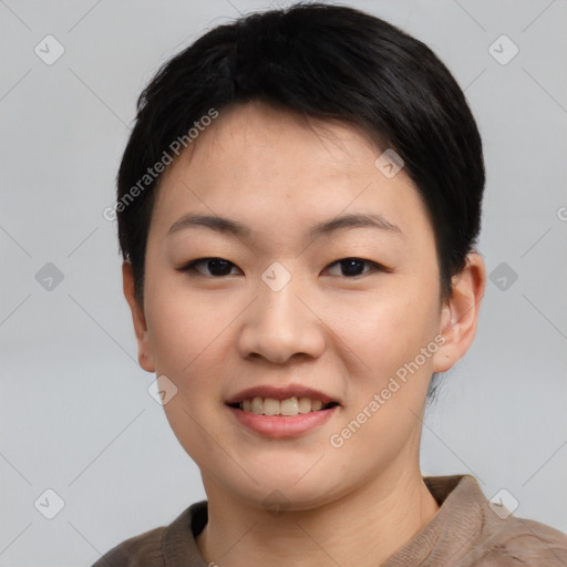 Joyful asian young-adult female with short  black hair and brown eyes