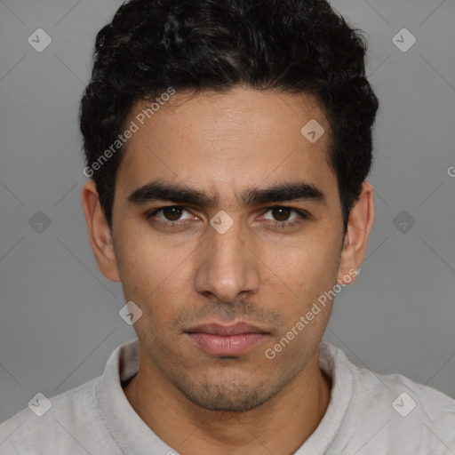 Neutral white young-adult male with short  black hair and brown eyes