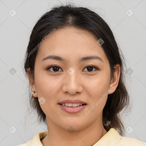 Joyful asian young-adult female with medium  brown hair and brown eyes