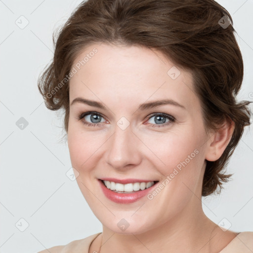 Joyful white young-adult female with medium  brown hair and green eyes