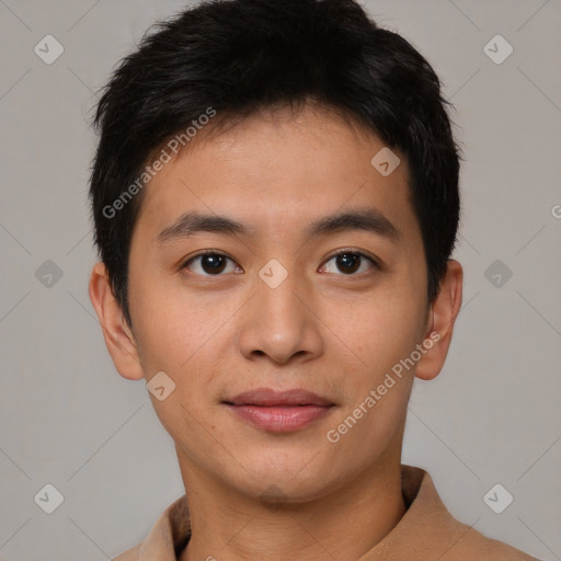 Joyful asian young-adult male with short  brown hair and brown eyes