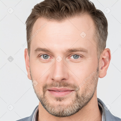 Neutral white young-adult male with short  brown hair and grey eyes