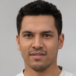 Neutral white young-adult male with short  black hair and brown eyes