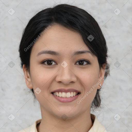 Joyful asian young-adult female with medium  black hair and brown eyes