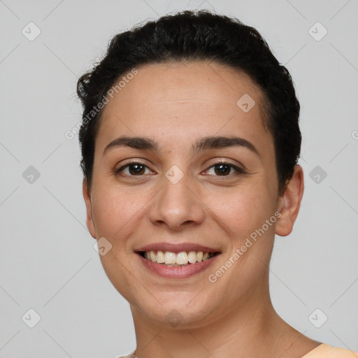 Joyful white young-adult female with short  brown hair and brown eyes