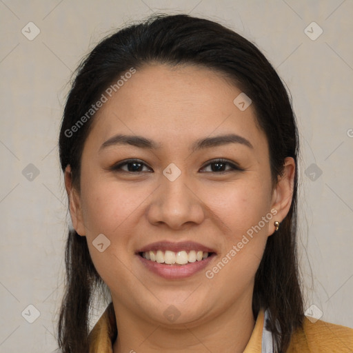 Joyful asian young-adult female with long  brown hair and brown eyes